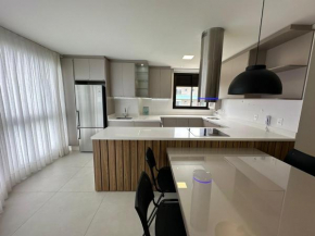 Apartamento 2 suítes frente mar 1 vaga de garagem